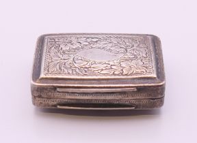 A Georgian silver vinaigrette. 3 cm wide.
