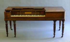 A 19th century mahogany spinet. 167.5 cm long.