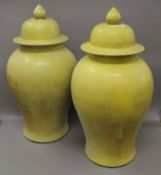 A pair of large Chinese porcelain yellow ground vases. 75 cm high.