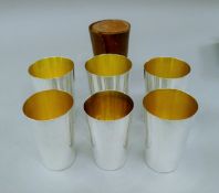 A cased set of silver plated hunt beakers. 11 cm high.