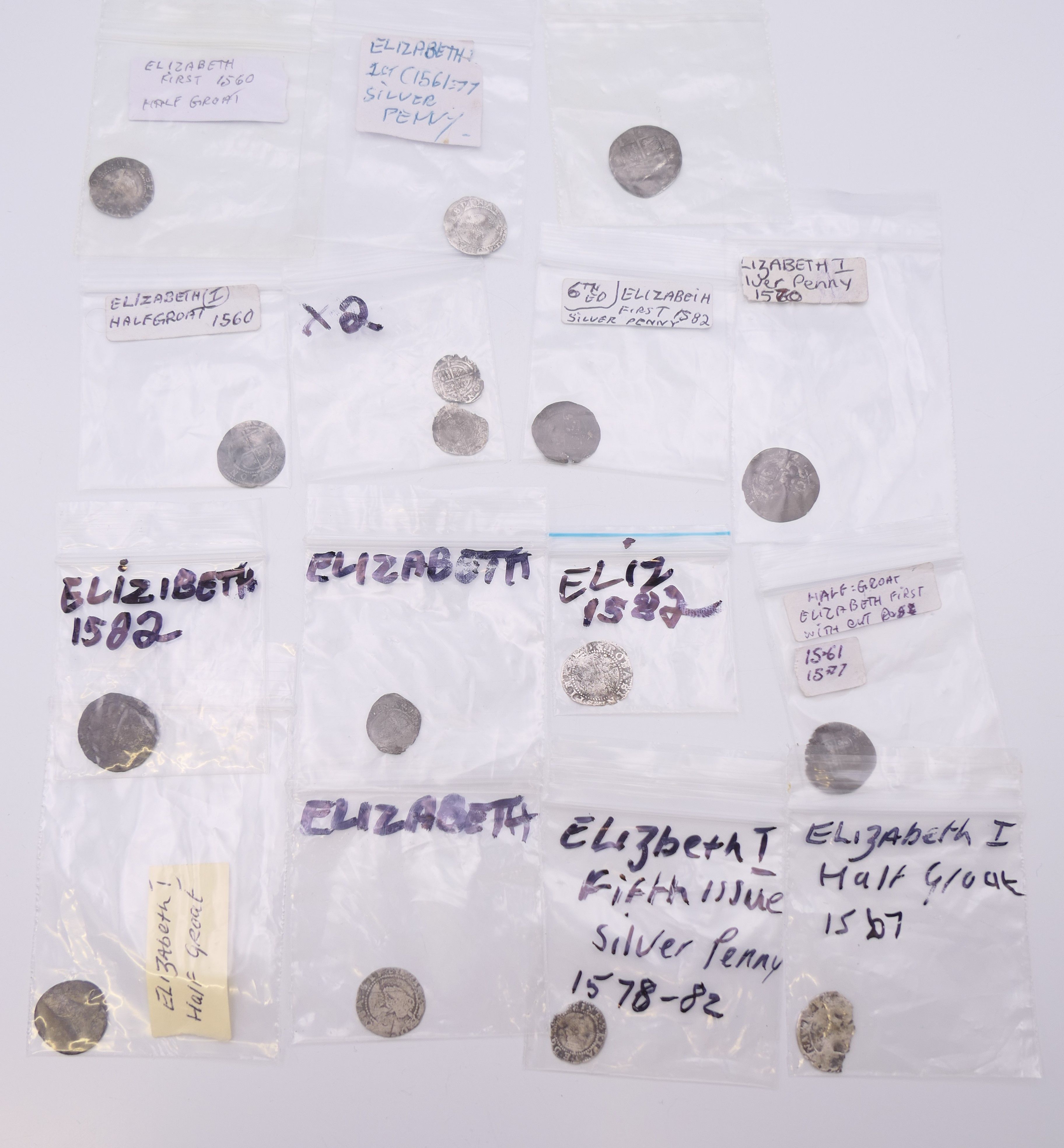A quantity of Elizabeth I coins.