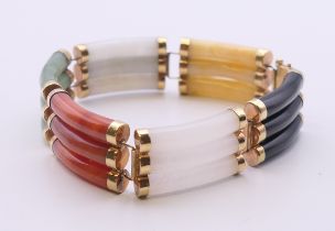 A Chinese 14 K gold and jade bracelet. 17.5 cm long.