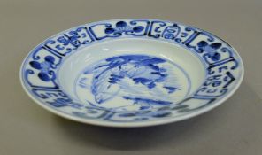 A Chinese blue and white porcelain bowl. 22 cm diameter.