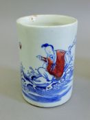 A Chinese blue and white porcelain brush pot. 15 cm high.