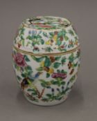 A 19th century Canton lidded vase. 11 cm high.