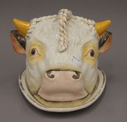 A Victorian bull's head pottery cheese dome. 16 cm high.