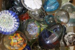 A collection of paperweights.