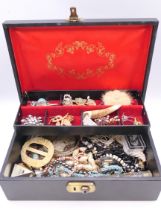 A box of costume jewellery.