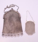 Two Continental silver mesh purses. The largest 11 cm wide.