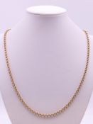 A 9 ct gold chain. 50 cm long. 8.7 grammes.