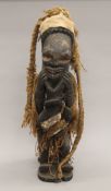 An African tribal wooden figure. 56 cm high.