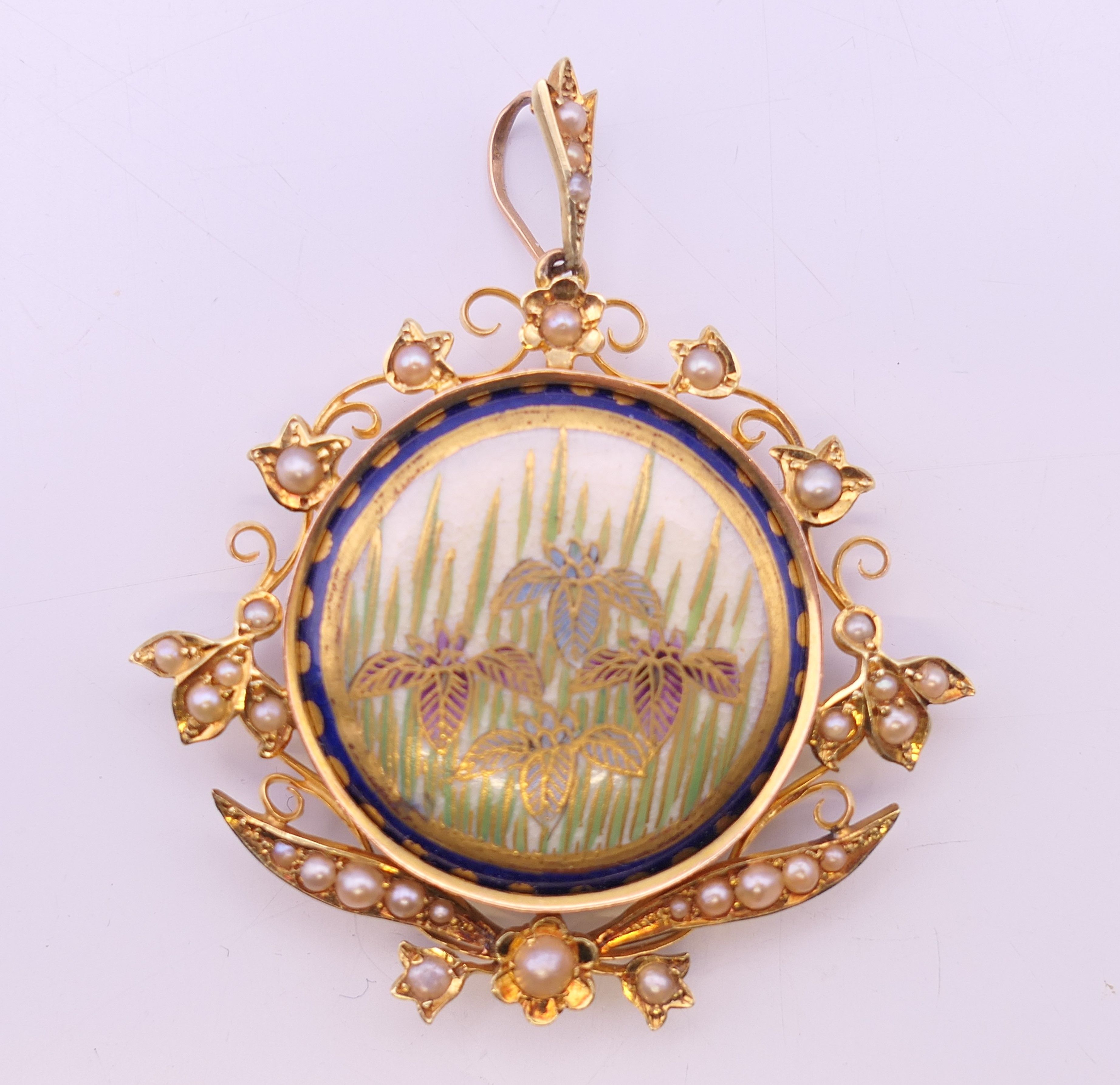 A gold and seed pearl pendant centred with a Satsuma porcelain plaque. 4 cm wide. - Image 2 of 13