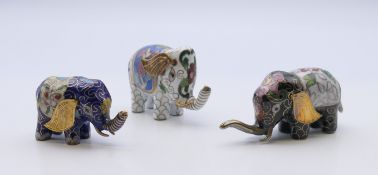 Three cloisonne elephants. The largest 4 cm high.