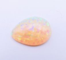 An opal specimen. 1 cm long.