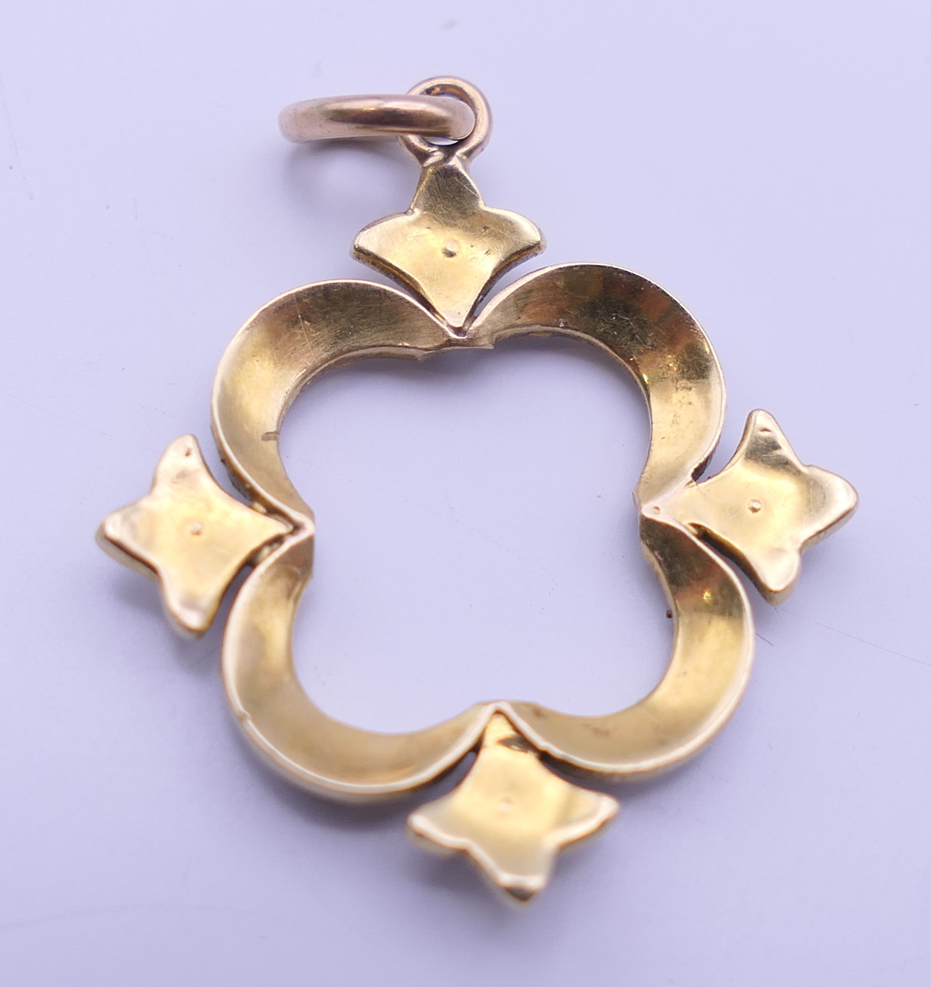 A Victorian 15 ct gold seed pearl pendant. 2.5 cm high. - Image 5 of 5