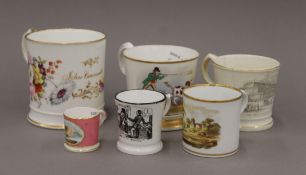 A collection of 19th century porcelain cups. The largest 10.5 cm high.