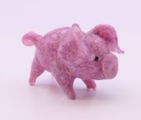 A glass model of a pig. 4.5 cm long.