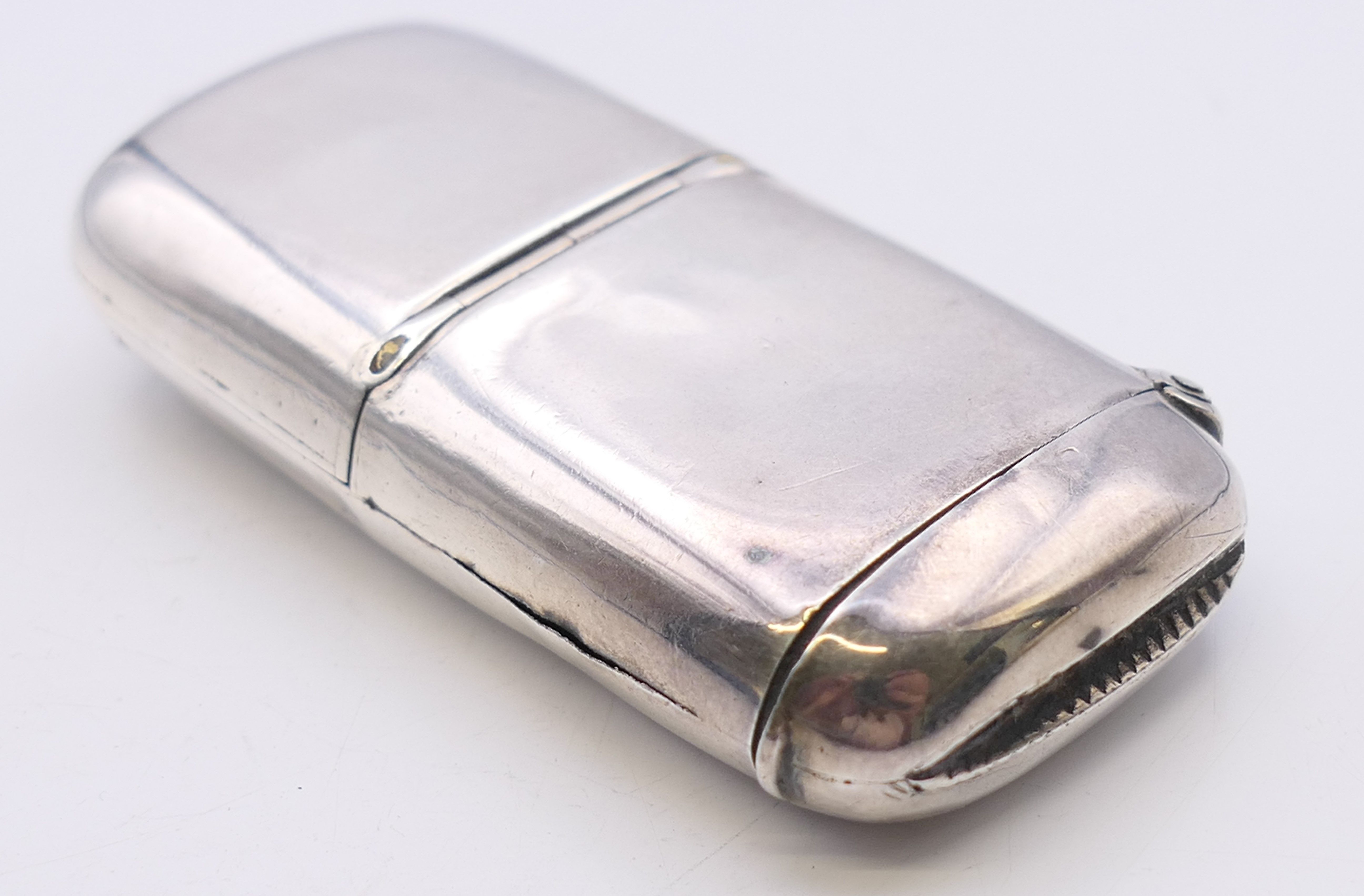 A Victorian silver vesta/single sovereign case, inscribed T H SILK, Chester 1890. 6.5 cm wide. 32. - Image 10 of 10