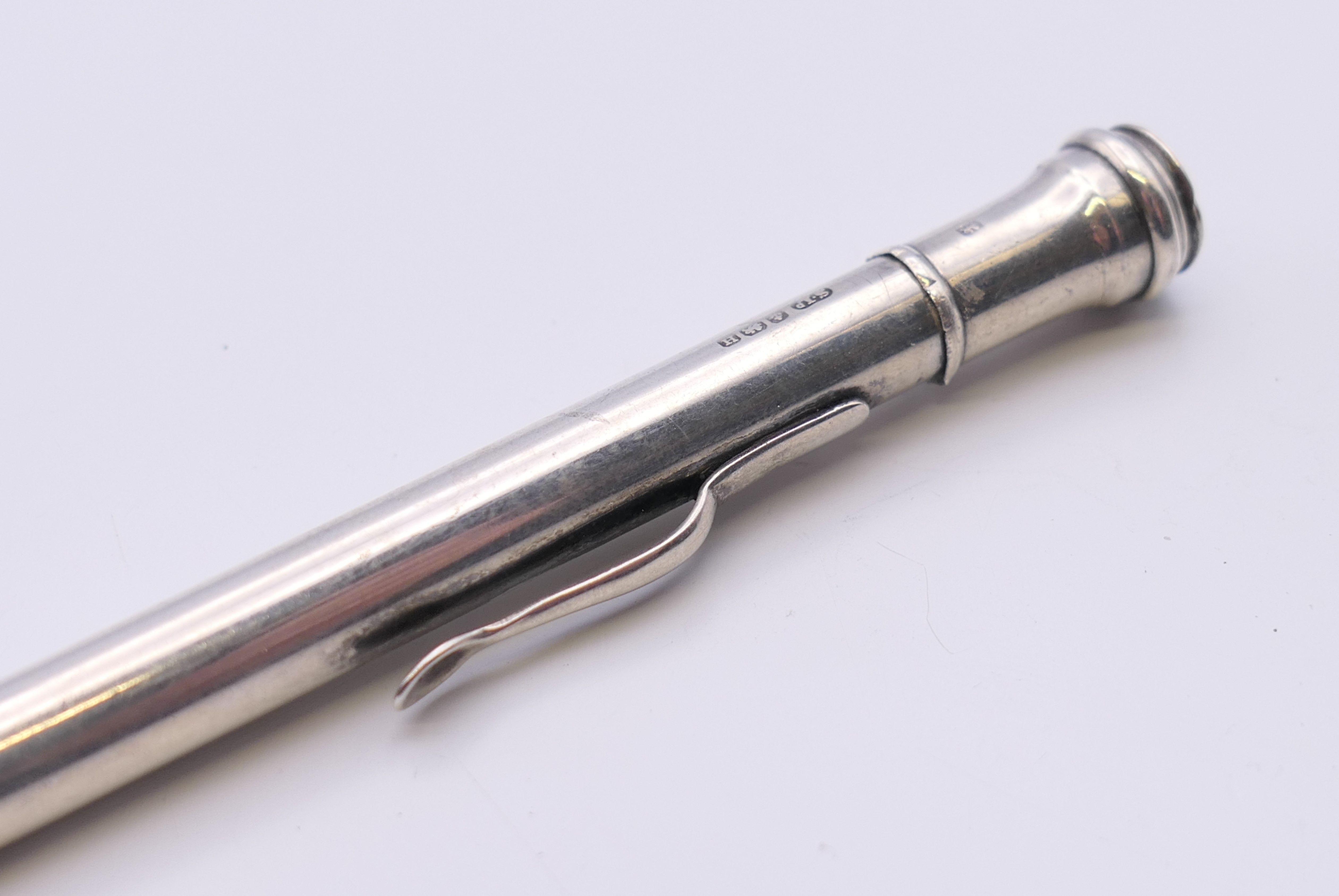 A silver propelling pencil, hallmarked Birmingham 1932. 12 cm long. - Image 2 of 6