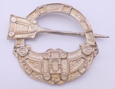 A silver kilt brooch. 7 cm wide.