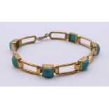 A gilt bracelet. 19 cm long.