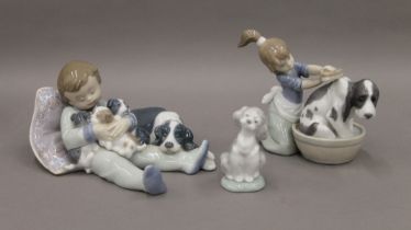 Three Lladro figures. The largest 16.5 cm long.