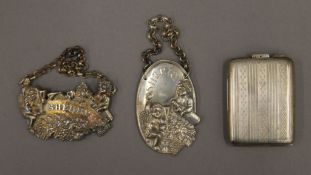 Two silver decanter labels and a silver matchbox case. The latter 5.5 cm long. The labels 61.