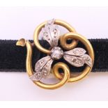 A Victorian gold rose diamond and pearl choker. 2 cm x 2.5 cm. 4.3 grammes total weight.