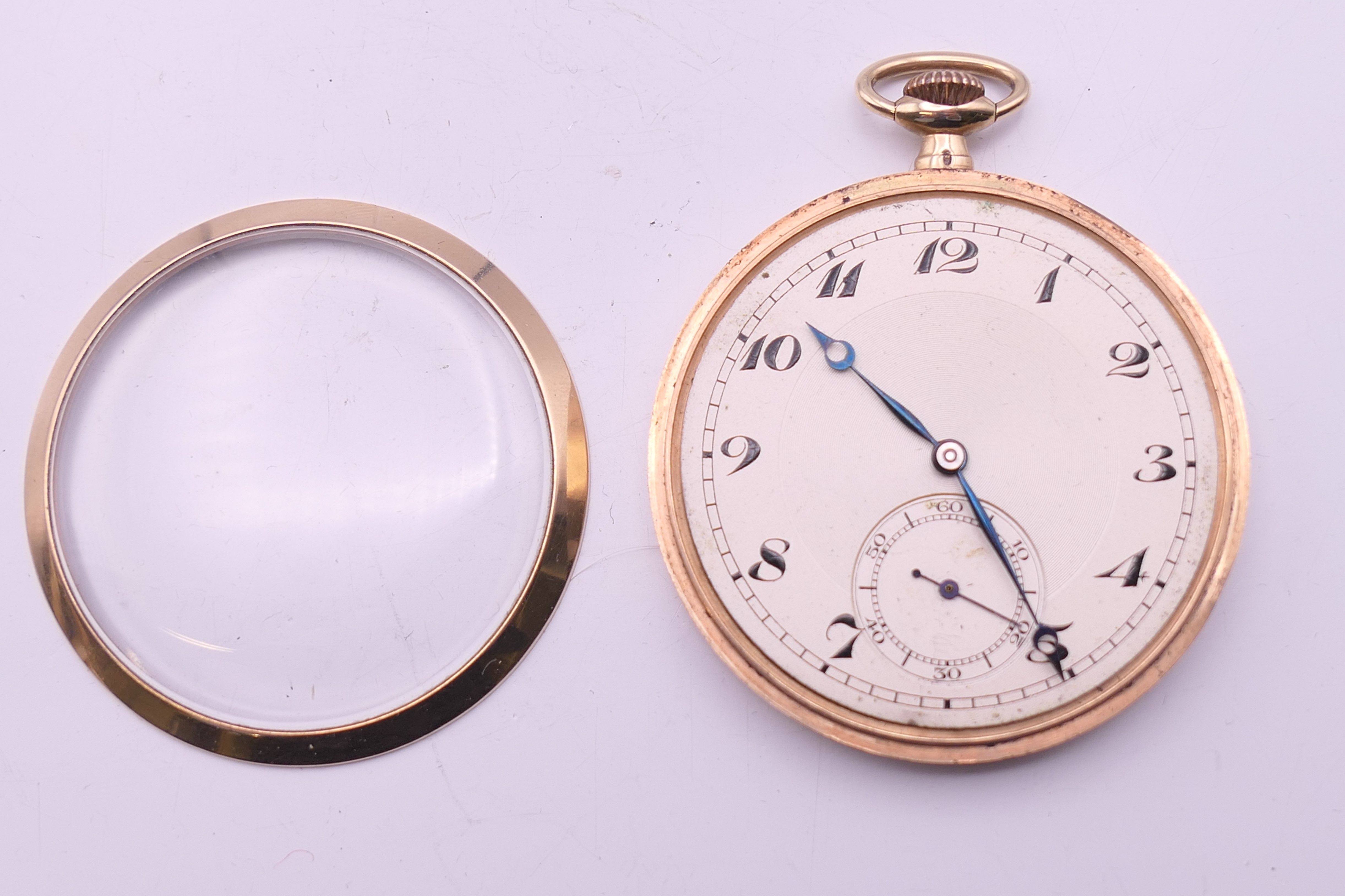 A 9 ct gold cased Dennison pocket watch, hallmarked for Birmingham 1951. 4.5 cm diameter. 49. - Image 3 of 7