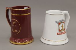 Two Whitbread display bar tankards. The largest 18 cm high.