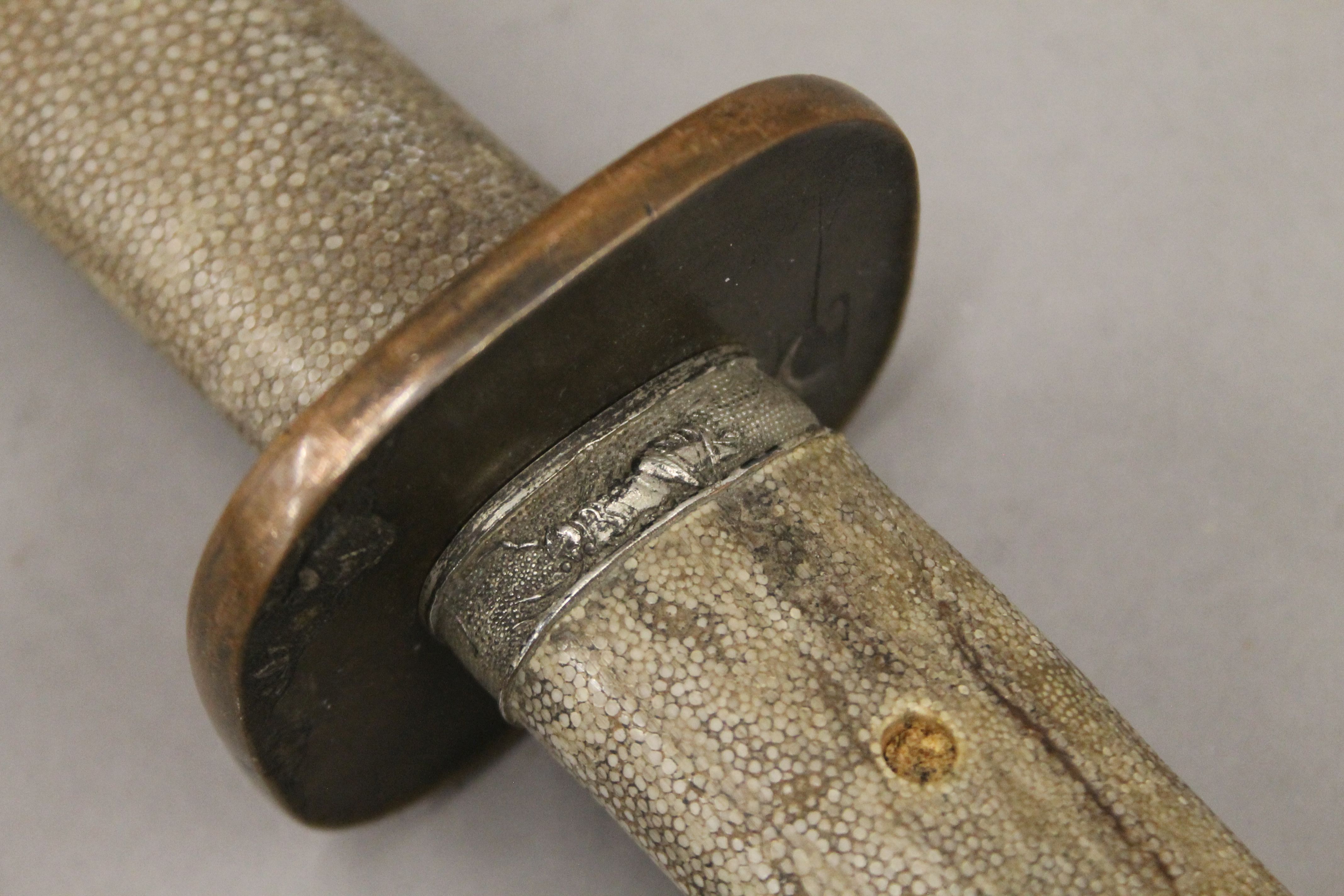 A Japanese sword with shagreen scabbard. 60 cm long. - Image 3 of 11