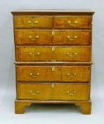 An 18th century and later walnut chest on chest. 126 cm high x 96.5 cm wide.