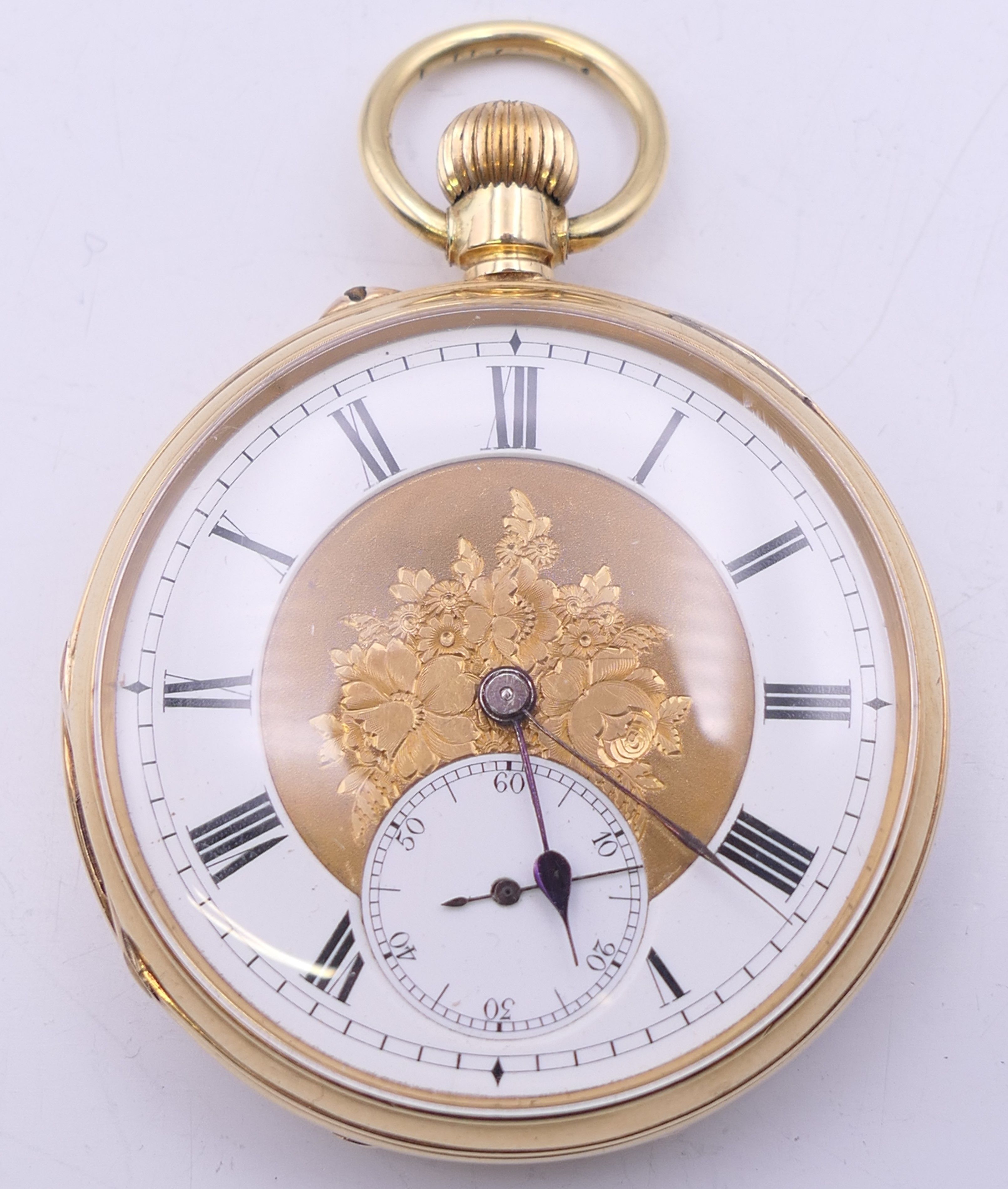 An 18 ct gold pocket watch with florally engraved dial, serial number 15514. 4.25 diameter. - Image 2 of 8