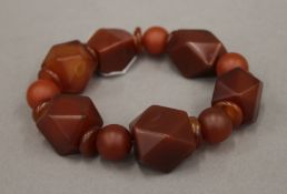 A Chinese agate bead bracelet, restrung, Qing Dynasty. 25 cm long.