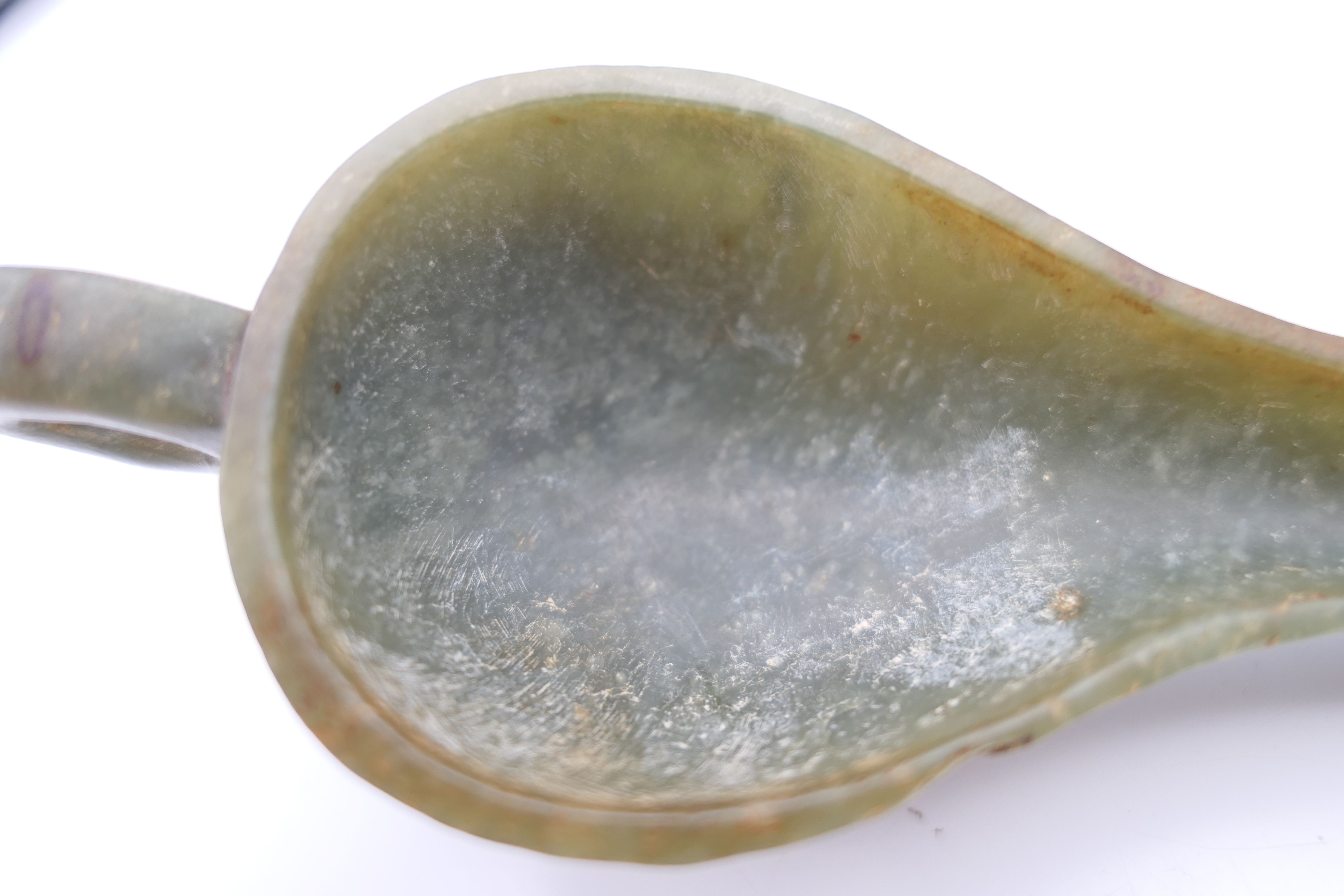 A Chinese green jade ceremonial wine cup, Eastern Han. 14 cm long. - Image 11 of 12