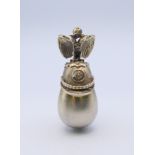 A silver egg and helmet pendant bearing Russian marks. 4 cm high.
