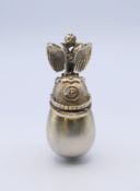 A silver egg and helmet pendant bearing Russian marks. 4 cm high.