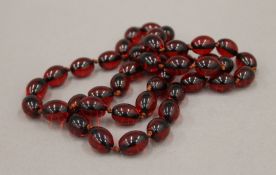 A bead necklace. 87 cm long.