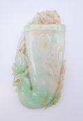 A Chinese light green jade phoenix, Qing Dynasty. 11 cm high.