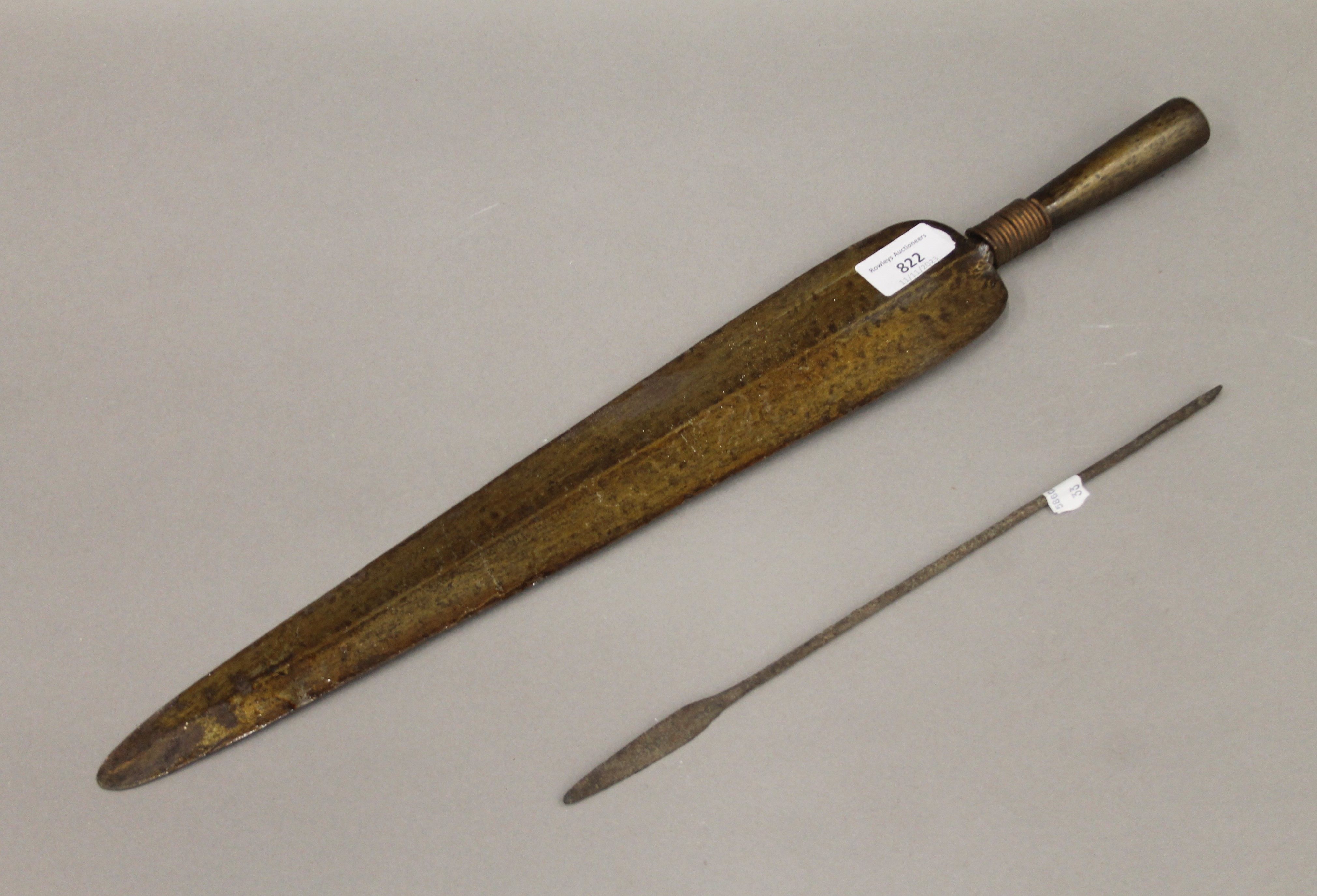 Two tribal spear heads. The largest 52 cm long.