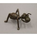 A bronze model of an ant. 5 cm long.