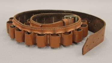 A Barbour leather gun belt. 110 cm long.