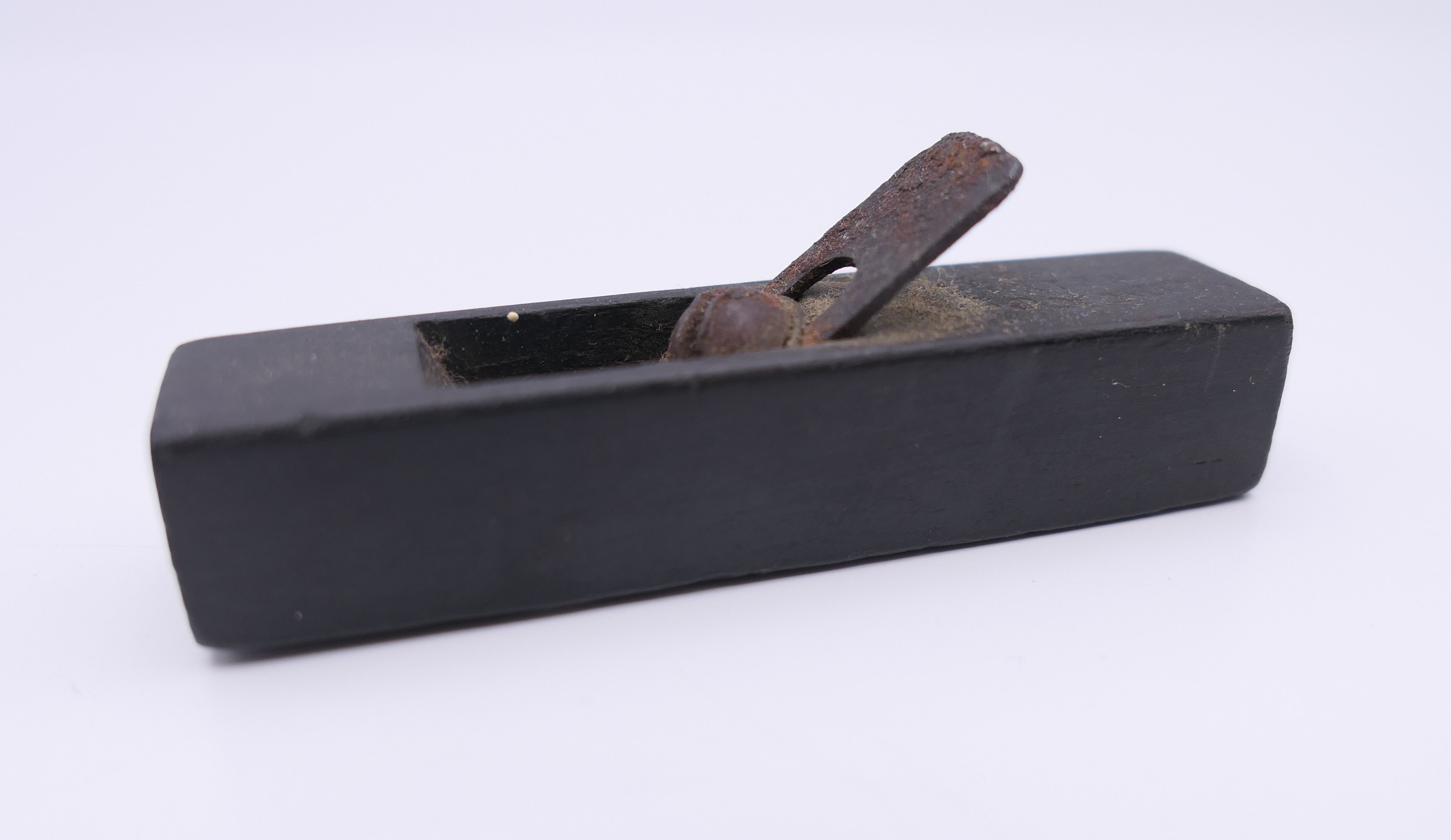 A Berry & Co of London patent miniature box plane. 6 cm long.