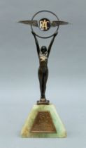 A 1935 RAC Eastbourne Rally trophy. 31.5 cm high.