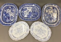 A matched pair of 19th century blue and white Willow Pattern meat plates, another,