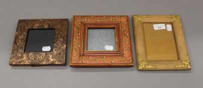 Three small vintage photograph frames. The largest 15.5 x 19 cm.