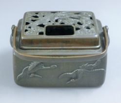 A Chinese lidded bronze handled warmer. 20 cm wide.