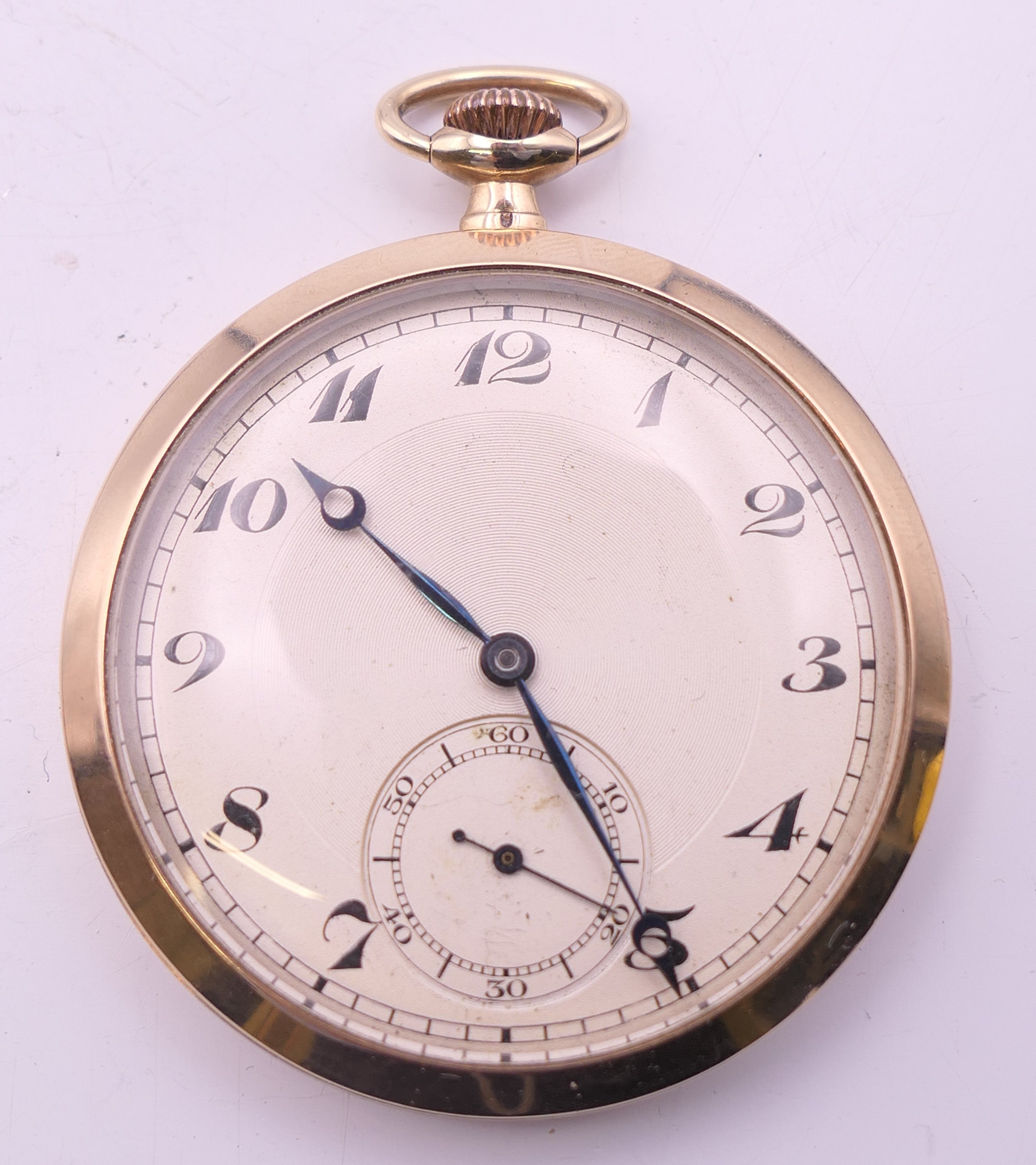 A 9 ct gold cased Dennison pocket watch, hallmarked for Birmingham 1951. 4.5 cm diameter. 49. - Image 2 of 7