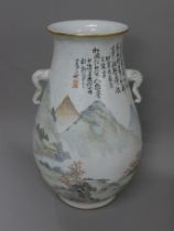A large Chinese vase decorated with a monkey. 44 cm high.