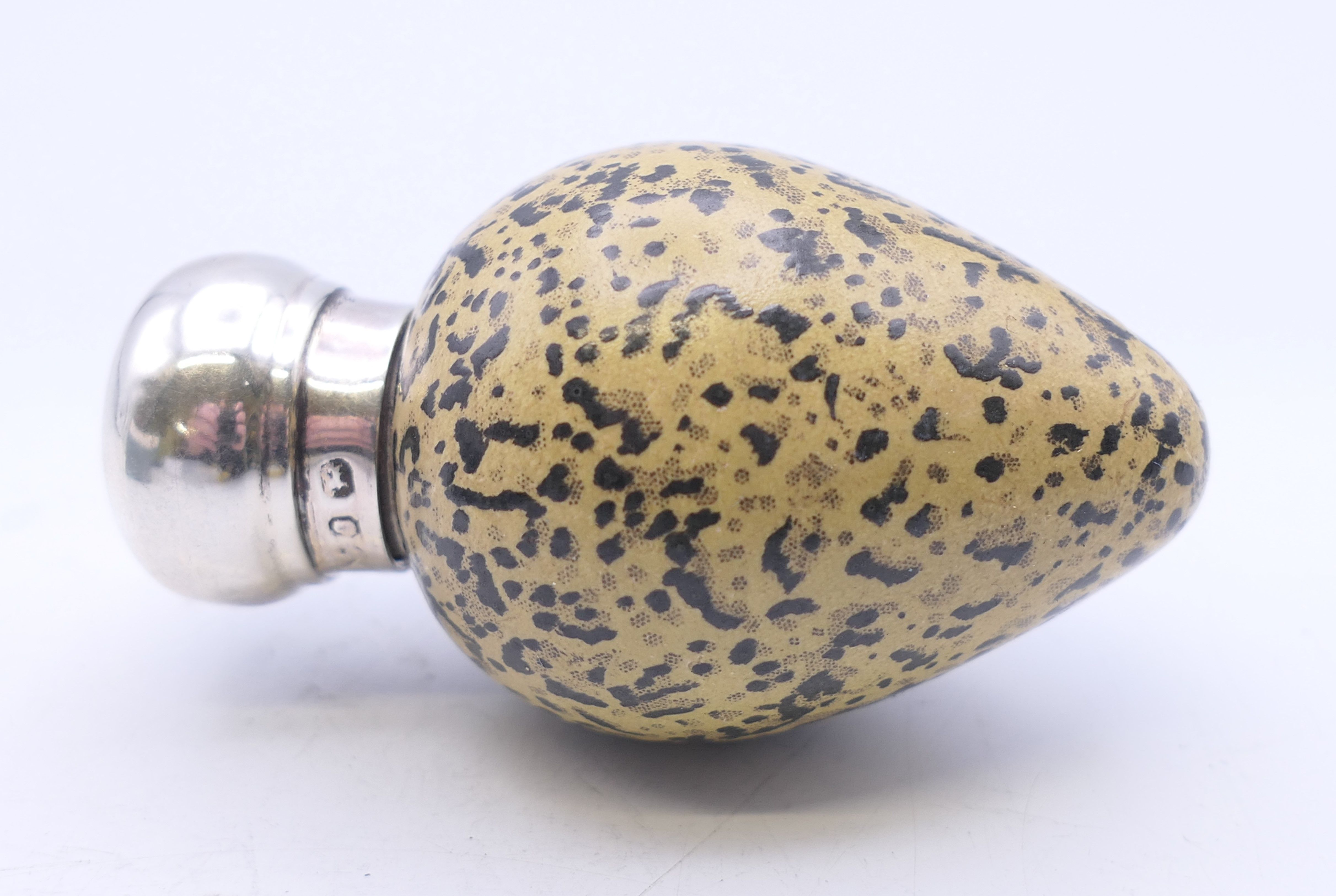 A Victorian silver mounted McIntyre porcelain scent bottle formed as a bird's egg, numbered 20772. - Image 2 of 5